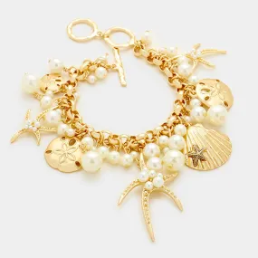 Pearl embellished starfish shell multi charm toggle bracelet for Women